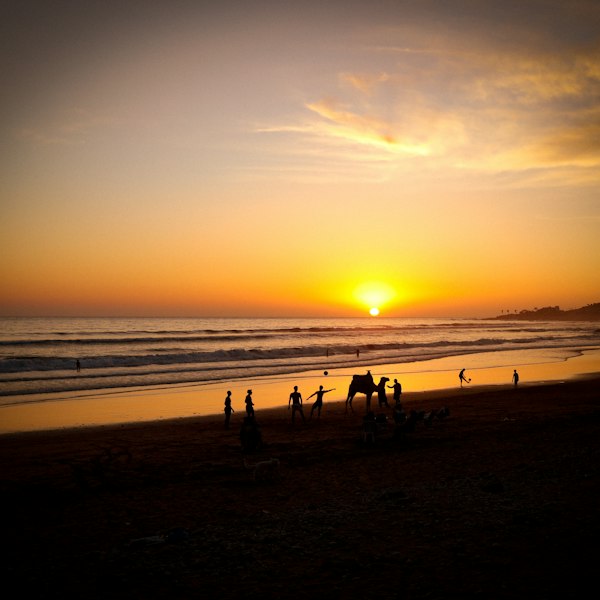 Surfers on the beach at Taghazout